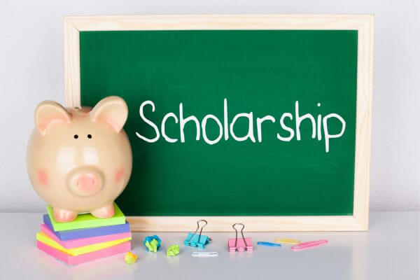 Picture of a sign that says scholarships.