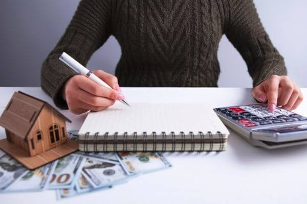 Picture of a lady creating a budget