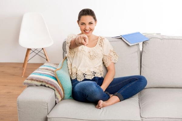 Photo of a lady being encouraging on completing the 100 envelope challenge on your money journey.