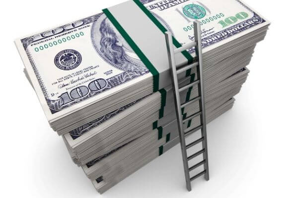 Picture of a pile of cash with a ladder on top asking are you ready to make money fast in stocks.