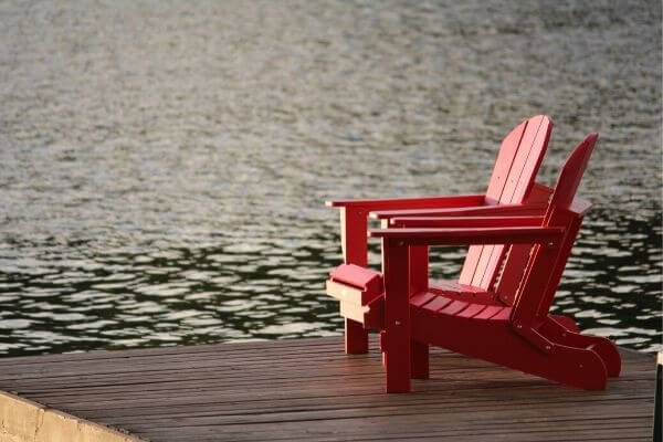 Picture of red chairs to imagine your life as a financially sound person.