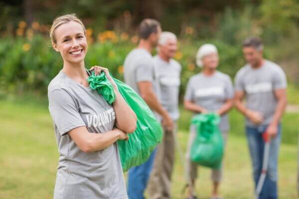 Picture of people volunteering for no money activities 