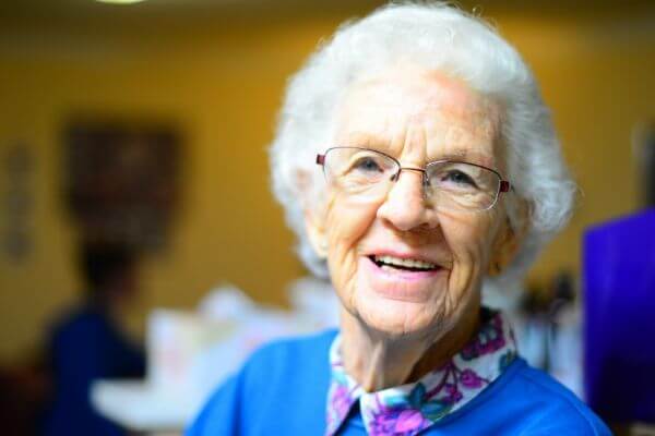 Picture of a smiling elderly lady wanting jobs to do after retirement.