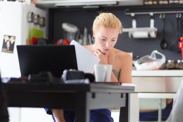 Picture of lady figuring out can I survive without working?