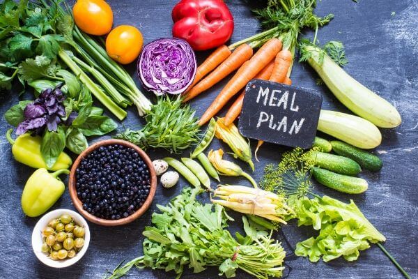 Picture of vegetables from a farmer's market for frugal green cooking and menu plan.