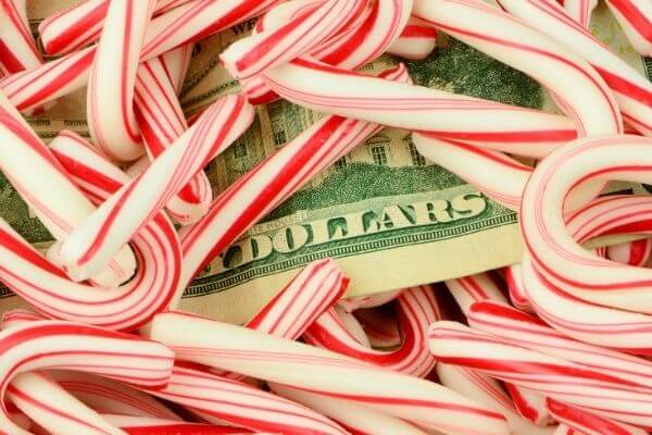 Picture of candy canes and money for cheap Christmas gifts for friends.