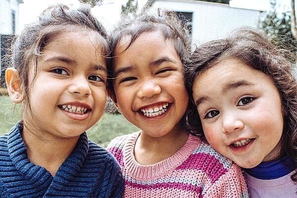 Picture of smiling kids participating in their 30 day challenge for kids.