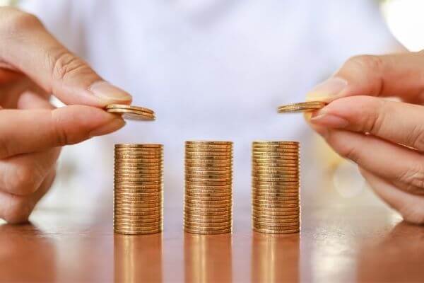 Stacks of coins to describe how to live stingy.