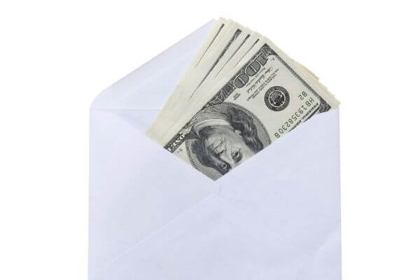 Picture of an envelope of cash for the 50 envelope challenge.