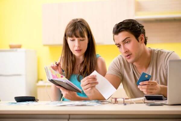 Photo of a couple being encouraging on completing the 200 envelope challenge on your money journey.