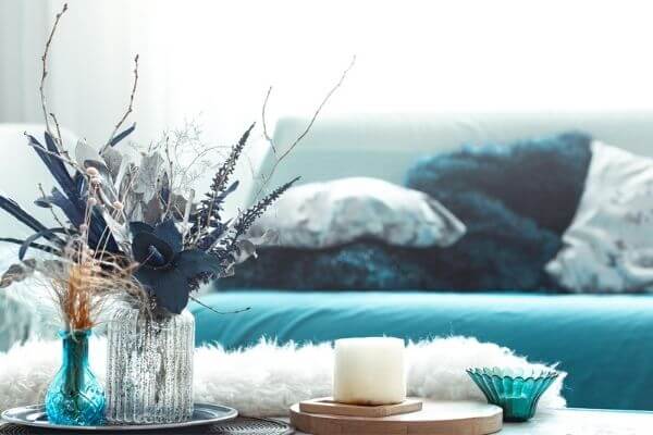 Picture of home decor in teal to ask the question is intention and purpose the same thing.