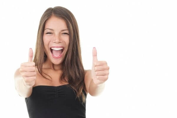 Picture of a really excited lady giving a thumbs up for future millionaire quotes.