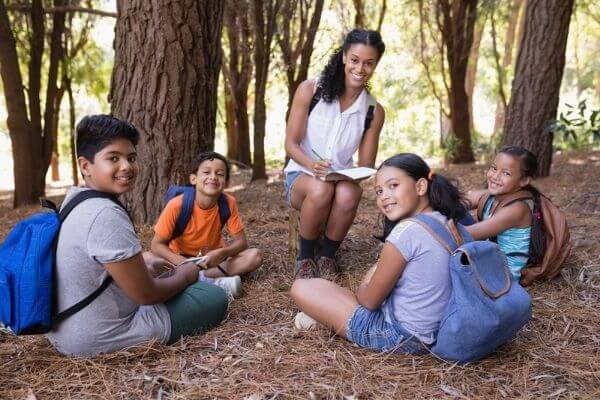 Picture of a teacher working at a summer camp.