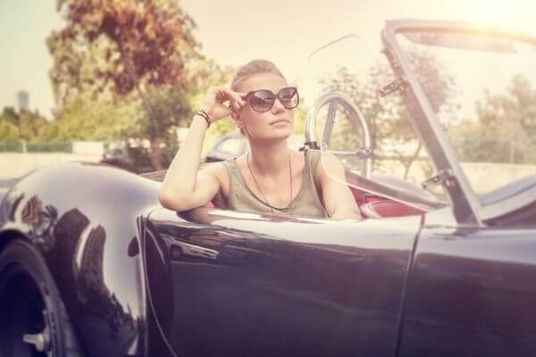 Picture of a rich lady in a convertible for money affirmations for success.