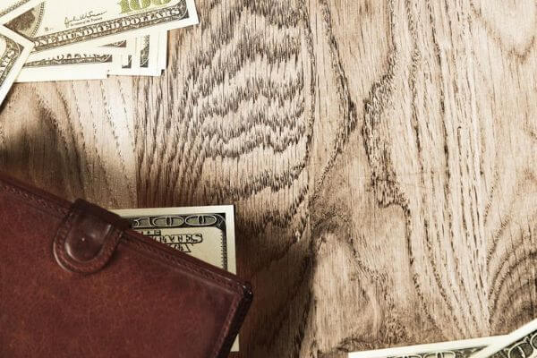 Picture of money and a wallet.