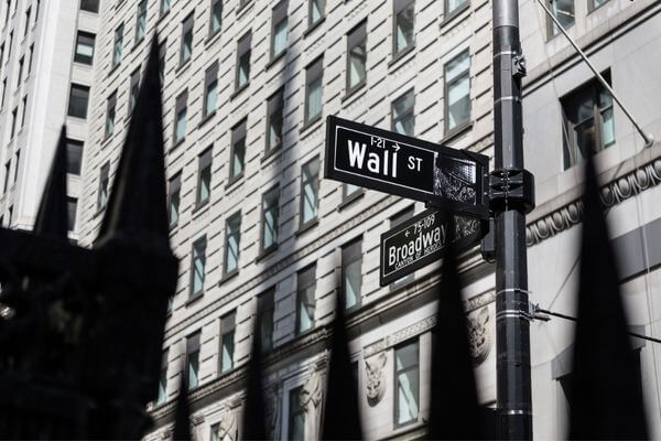 Picture of a street sign of Wall street for what movies are about wall street