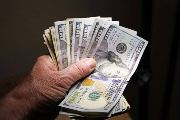 Picture of cash for how do you flip money quickly.