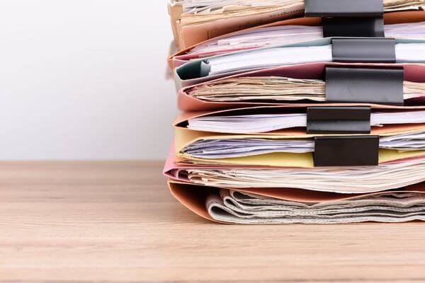 Picture of a stack of documents.