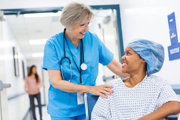 Picture of a nurse working in person.