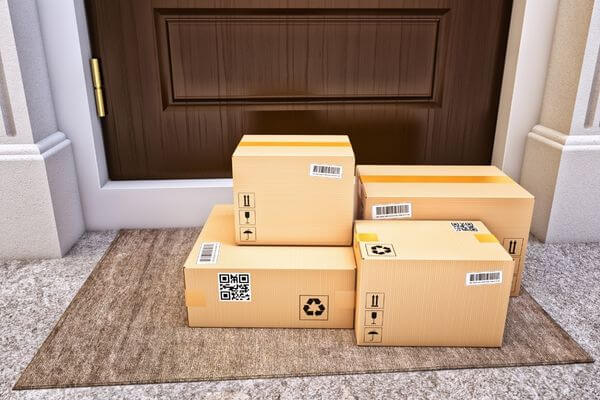 Picture of packages on a doorstep for what time do packages usually arrive.