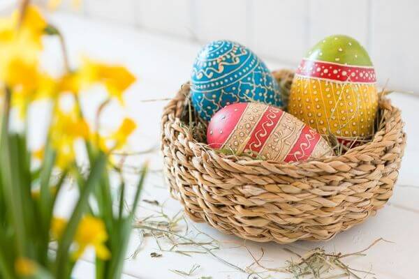 Picture of eggs in a basket for teenage Easter basket ideas.