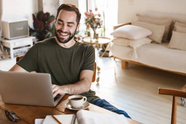 Picture of a guy working from home.