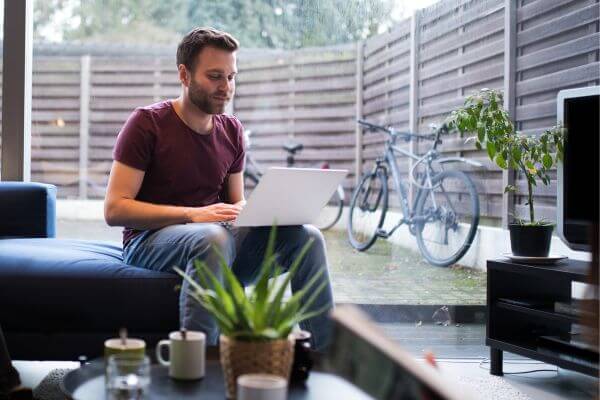 Picture of a guy wondering how much money should I have if I want to Move out.