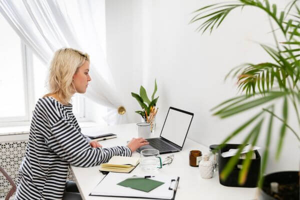 A lady working from home.