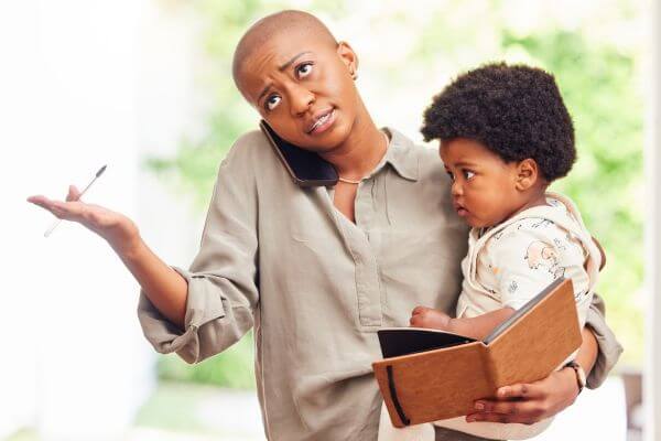 Picture of a mom holding a child for how to make the most of your day.