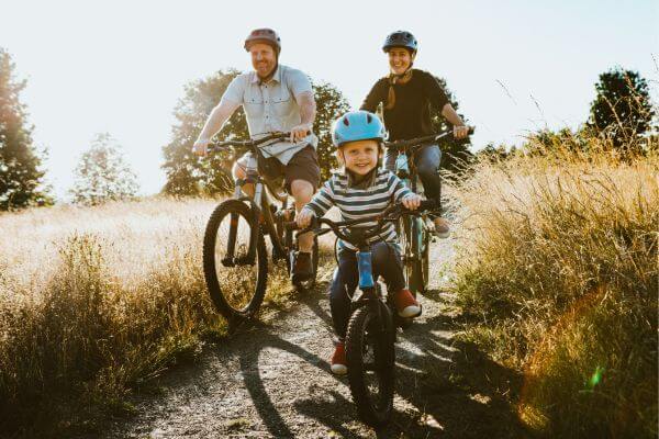 Picture of a family on a bike ride.