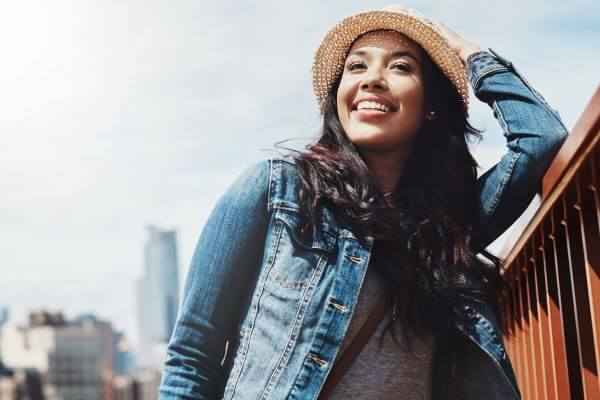 Picture of a lady exploring the city for what to do today that is out and about.