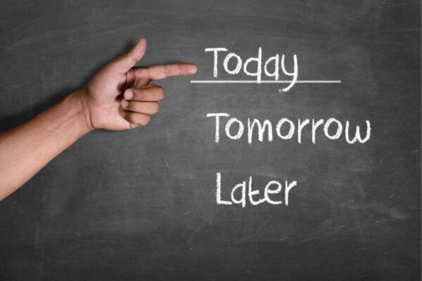 Sign that says today, tomorrow, later.