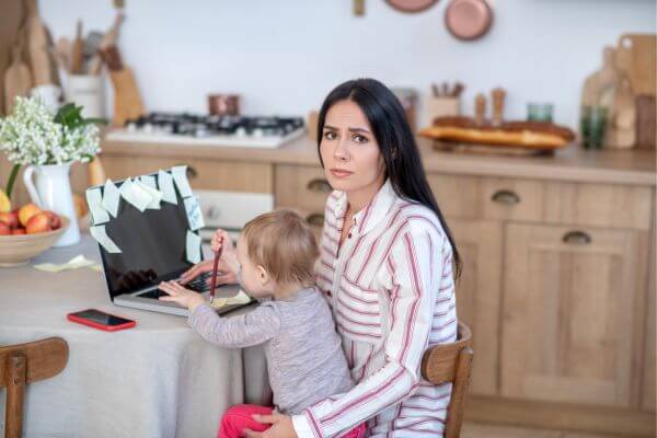 Picture of a mom who is stressed out.