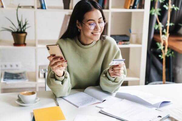 Picture of a lady learning how to customize your cash app card.