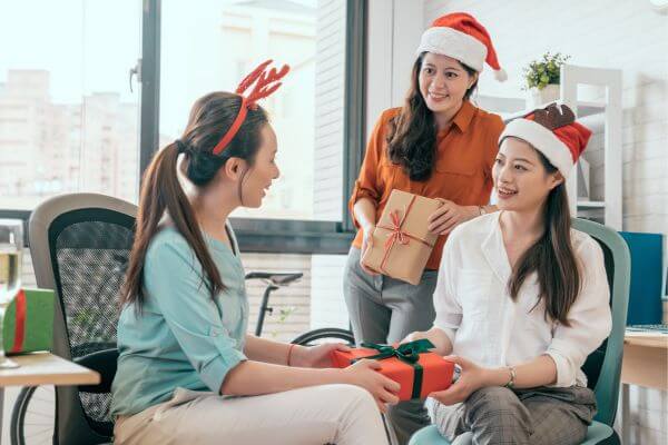 Picture of people swapping Christmas items