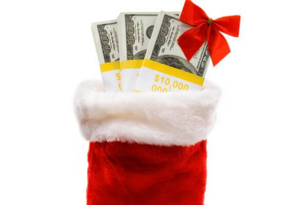 Picture of a red stocking filled with cash