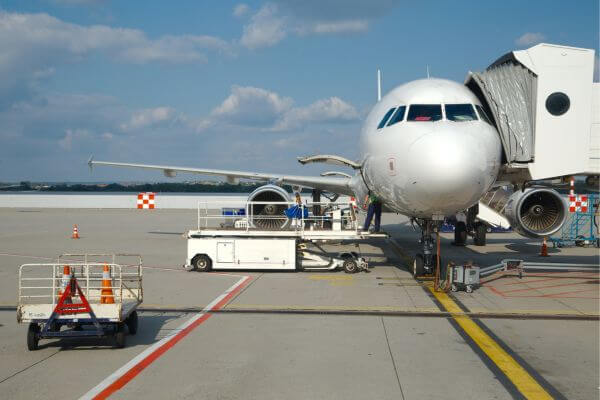 Picture of an airplane at the gate.