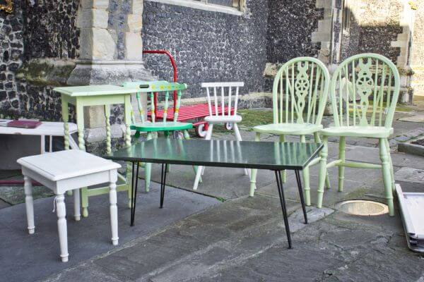 Image of the furniture set such as tabled glass and chairs.