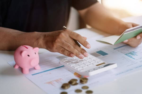 Picture budgeting and saving as strategies to become debt-free.