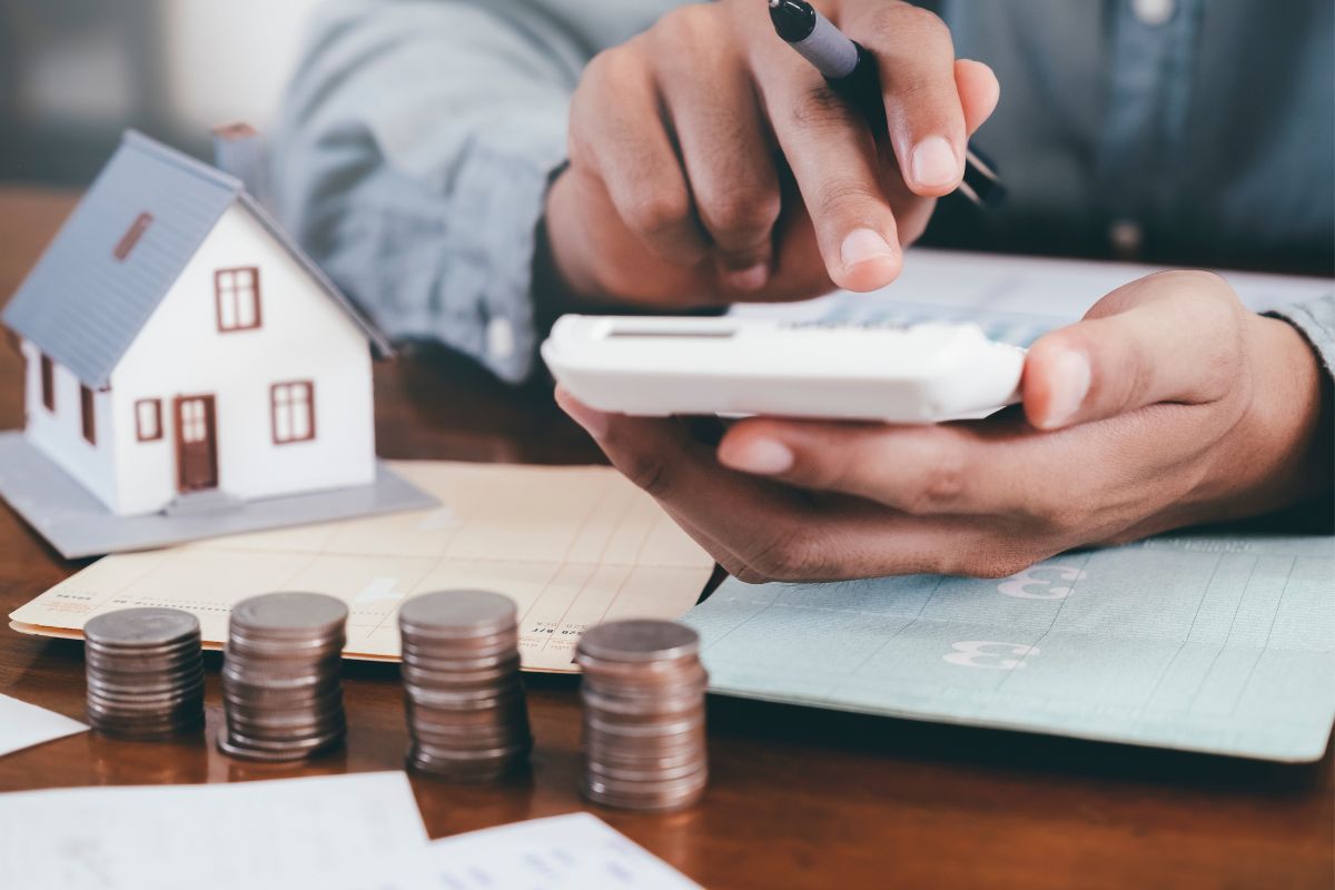 The picture shows someone trying to reduce housing expenses.  