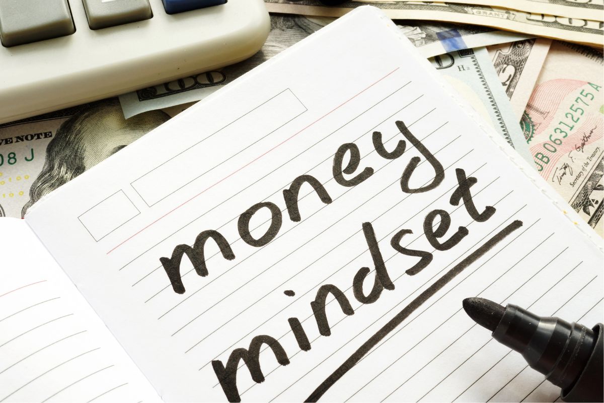 Photo of a notebook with money mindset wording.
