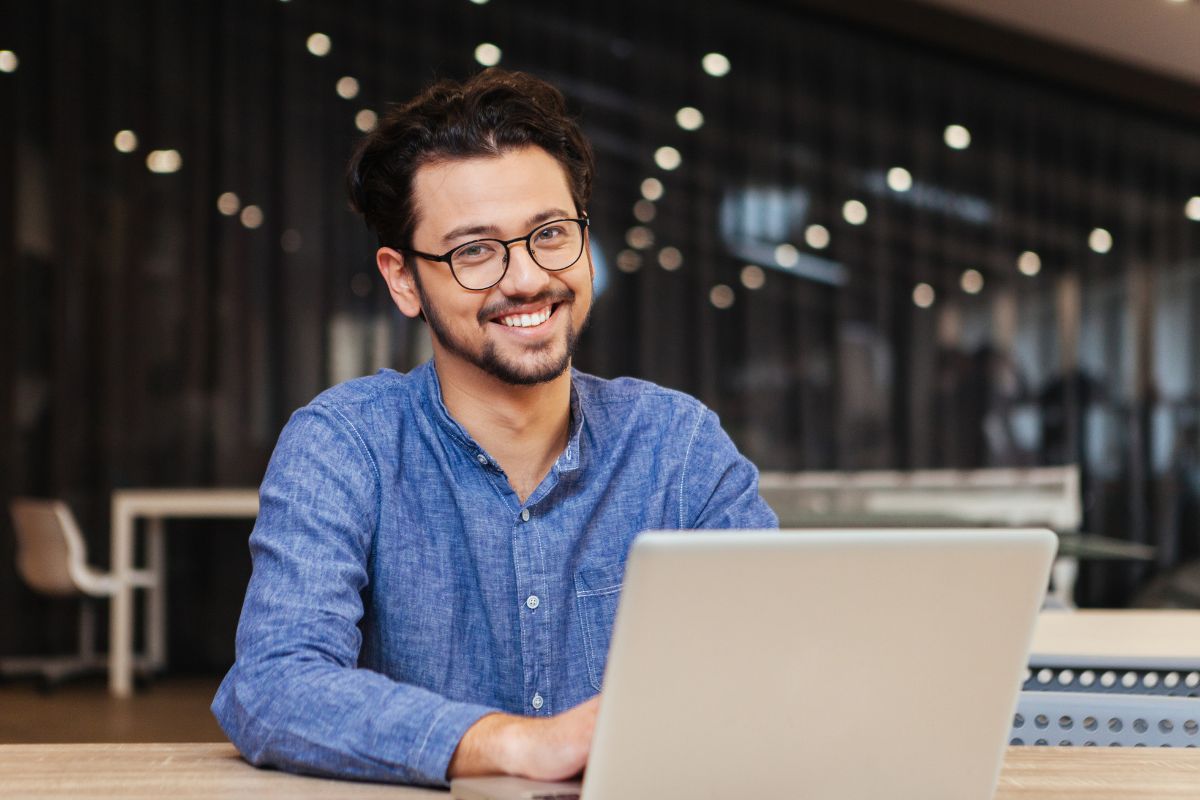 Image of a man using a laptop.