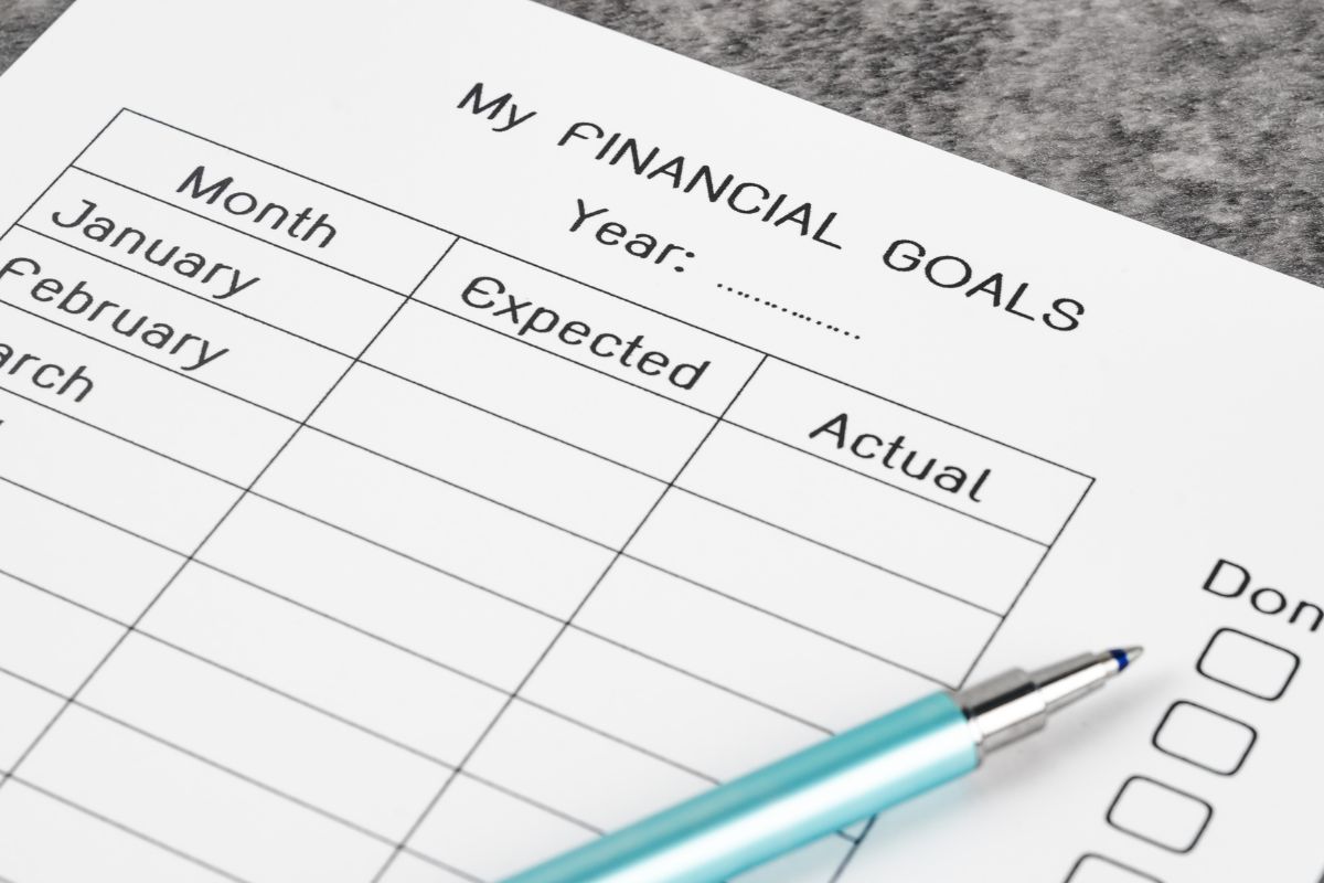 Picture of a paper with financial goals.
