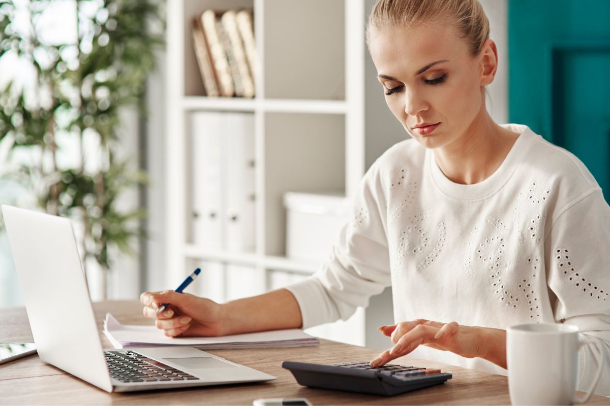 Image of a woman budgeting.