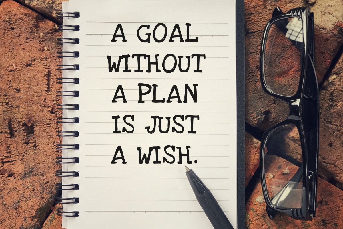 The image of a notebook with a quote.