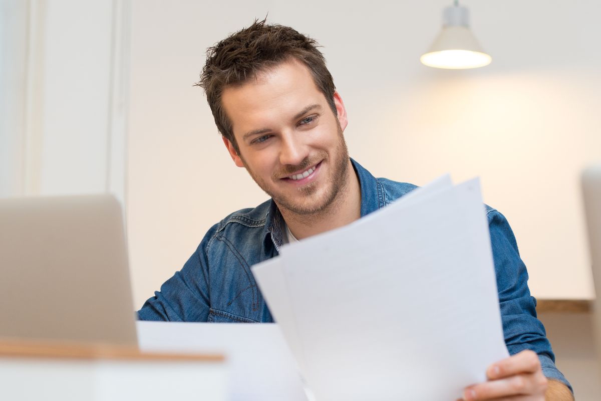 Image of a man figuring out his net worth.