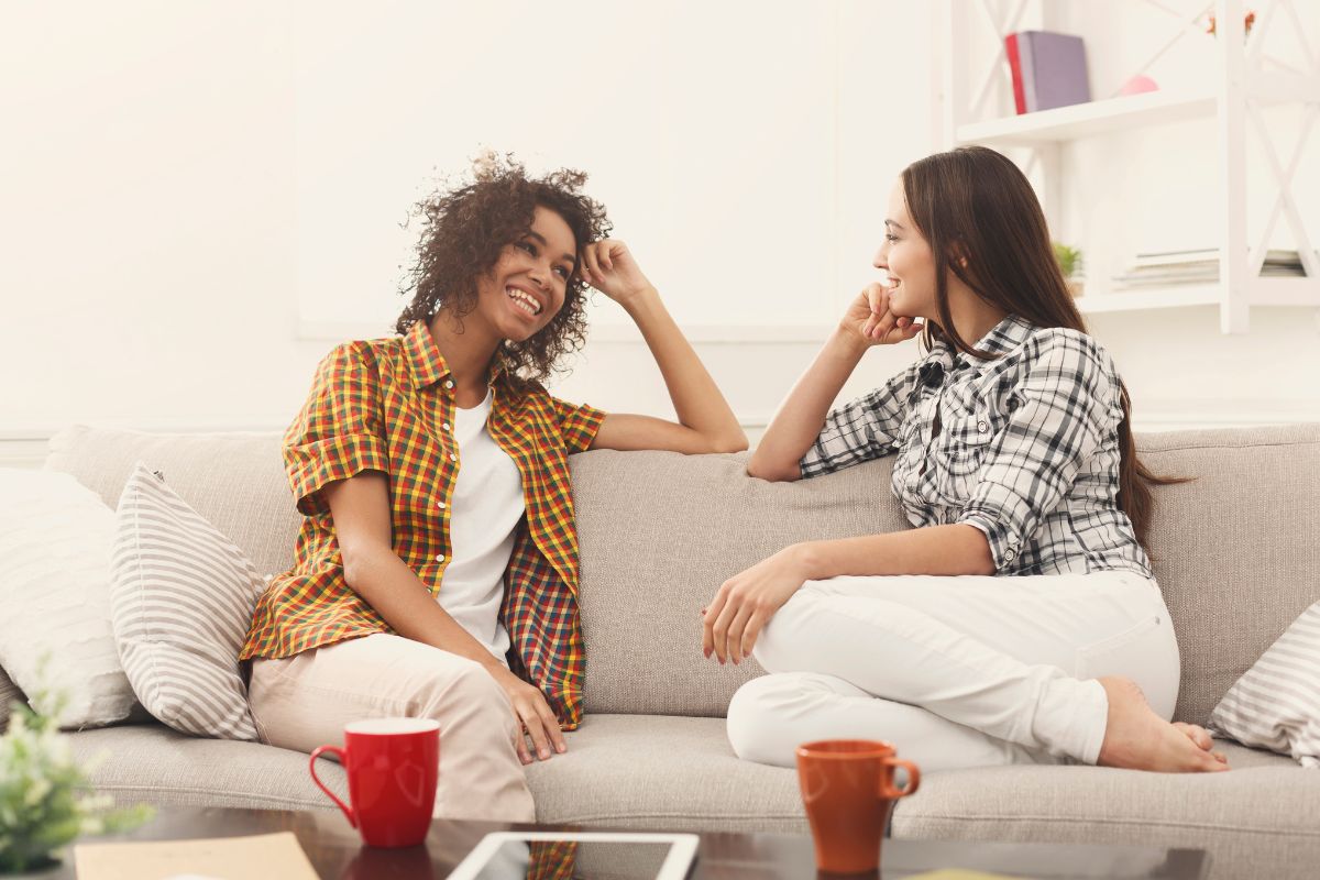 Image of women talking to each other.