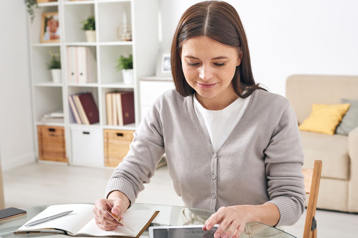 Picture of a woman organizing her finances.