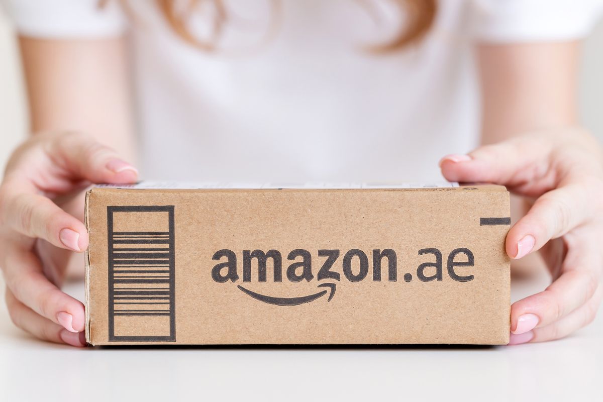 The photo shows a woman ordering on Amazon.