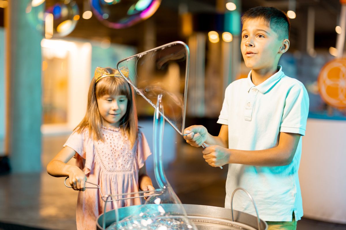 Picture of kids laying bubbles.